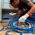 A contractor installing home fibre. 
